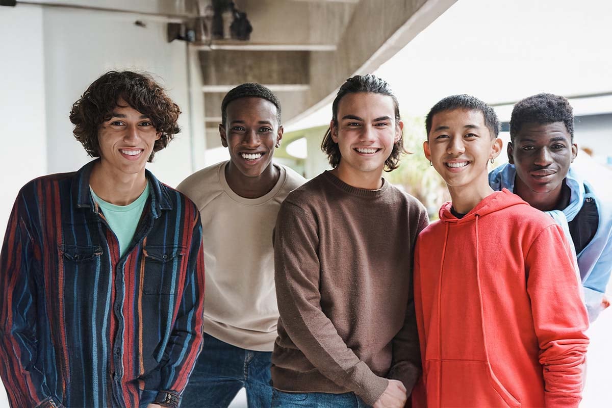 diverse-group-of-happy-male-youths